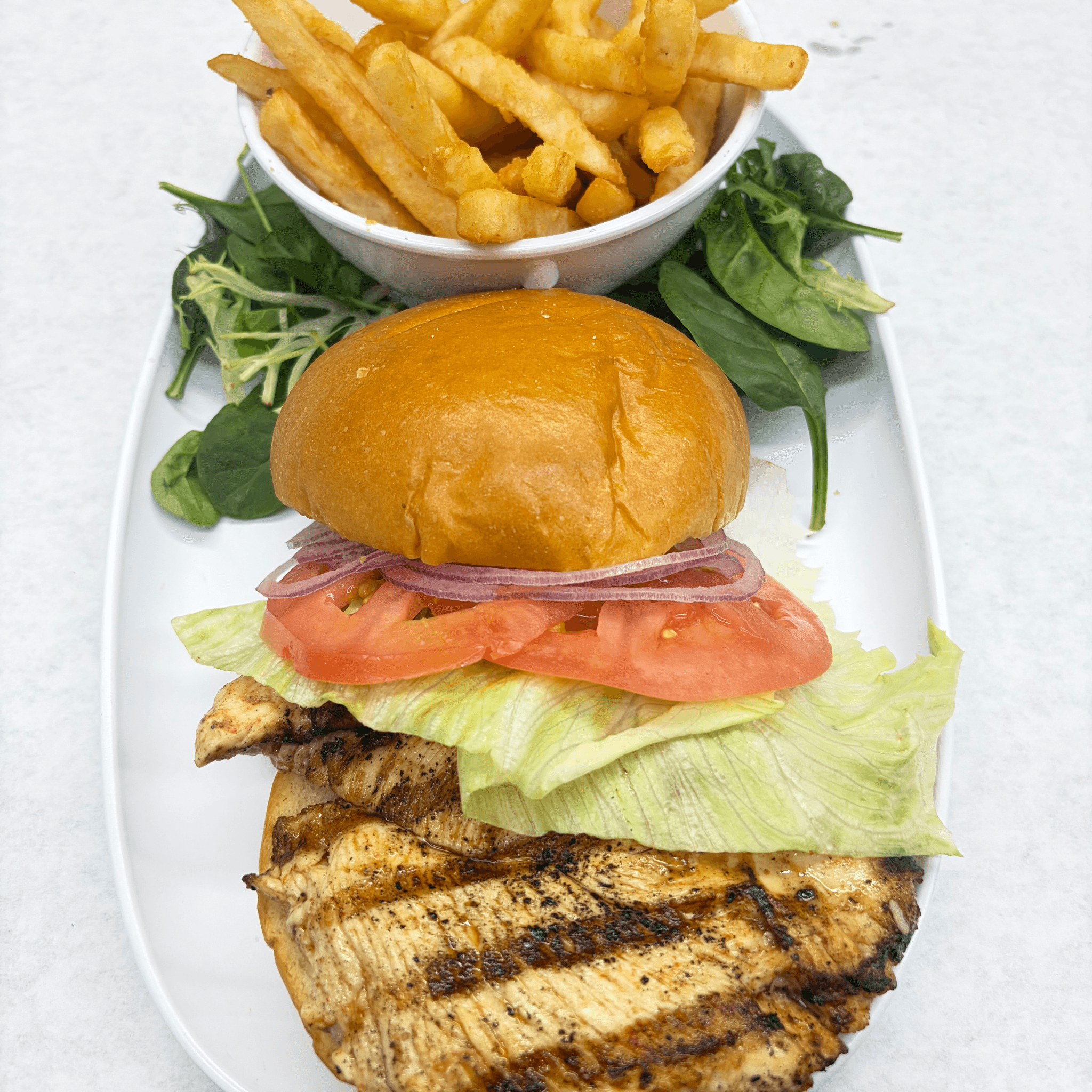 Grilled Chicken Sandwich With Fries.